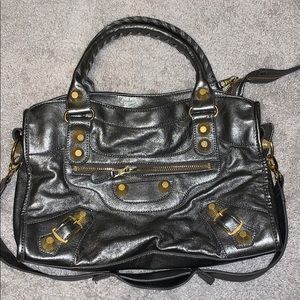Beautiful silver metallic bag with gold hardware